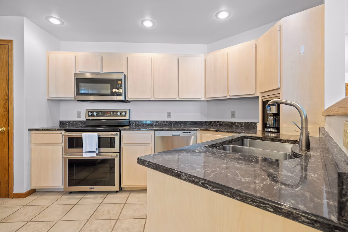 Fully equipped gourmet kitchen with modern appliances